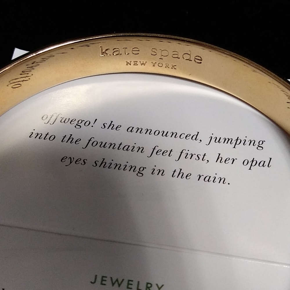 Kate Spade idom gold tone bangle